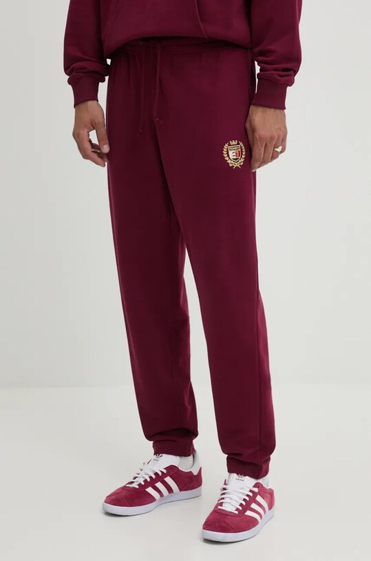 Pamučni donji dio trenirke Tommy Jeans pletivo bordo DM0DM19805