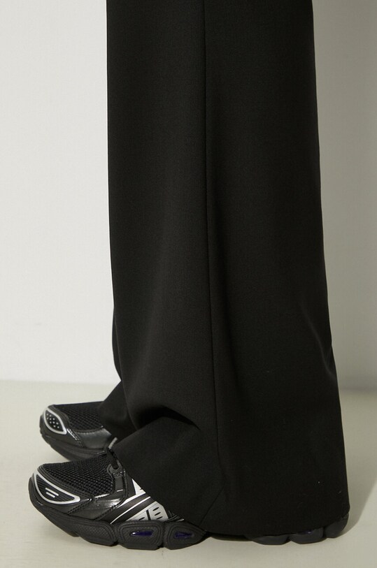 Vlnené nohavice AMBUSH Flare Pants BMCO003F24FAB0011000 čierna
