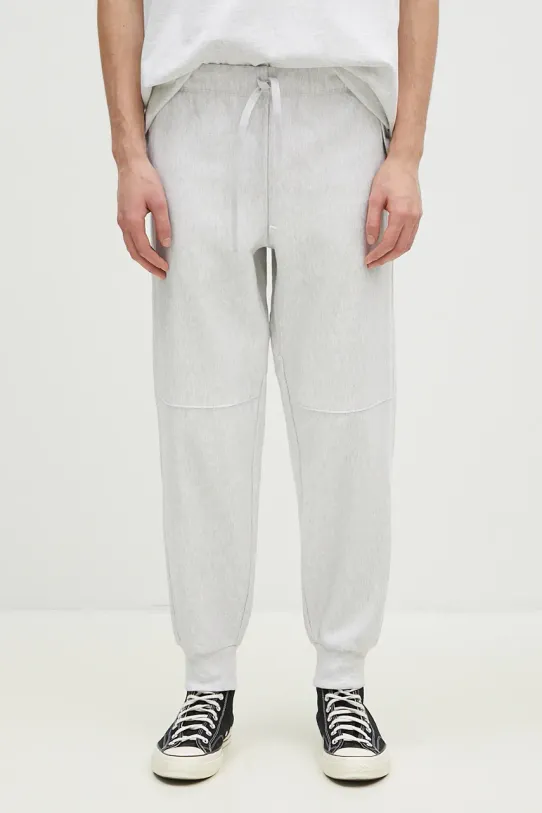 Donji dio trenirke Carhartt WIP American Script Jogging Pant melanž siva I027042.482XX