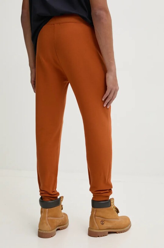 Одежда Хлопковые спортивные штаны C.P. Company Diagonal Raised Fleece Cargo Sweatpants 17CMSP017A005086W оранжевый