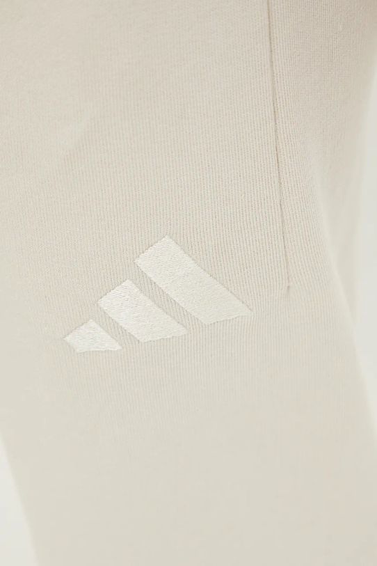 Бавовняні спортивні штани adidas All SZN бежевий IY6559