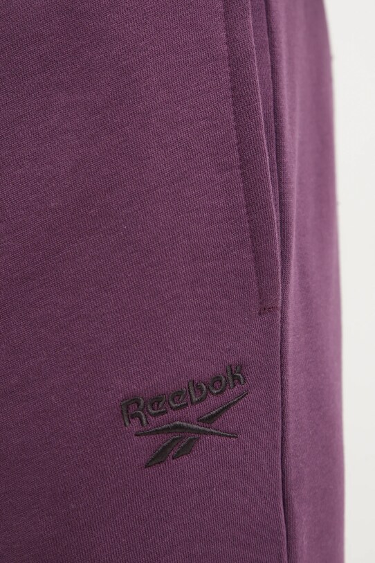 Reebok spodnie dresowe IDENTITY fioletowy 100206013