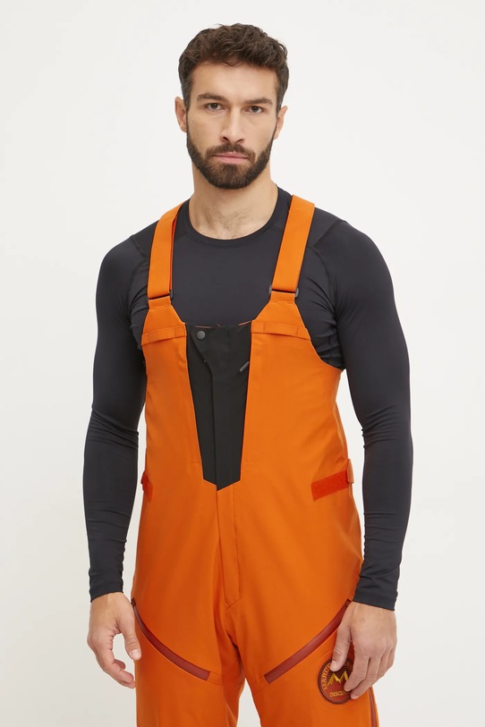 Lyžařské kalhoty Descente Descente x Marco Odermatt oranžová DWMYGD50M