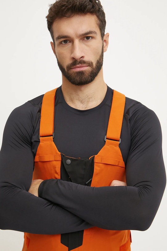 Lyžařské kalhoty Descente Descente x Marco Odermatt DWMYGD50M oranžová