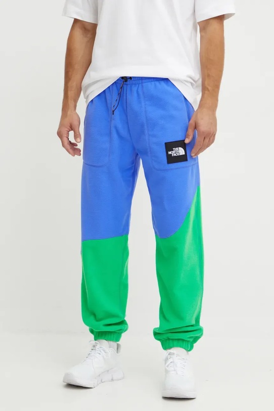 Tepláky The North Face TNF x Yinka Ilori modrá NF0A89GG0IG1