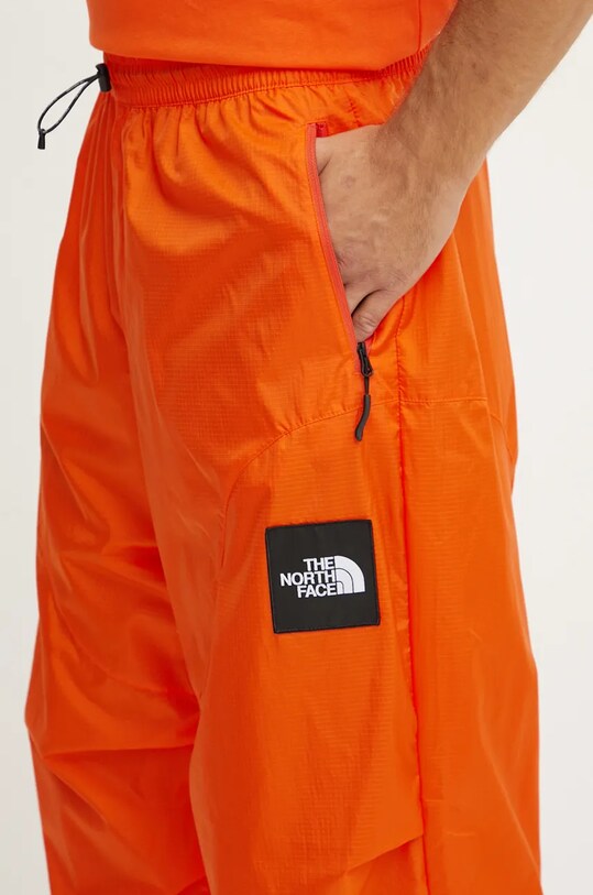 The North Face trousers TNF x Yinka Ilori orange NF0A89GPA6M1