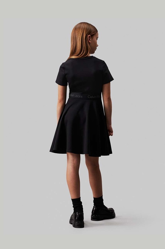 Otroška obleka Calvin Klein Jeans IG0IG02584.9BYH. črna
