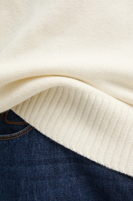 Sveter s prímesou vlny Calvin Klein Jeans J30J326195 béžová