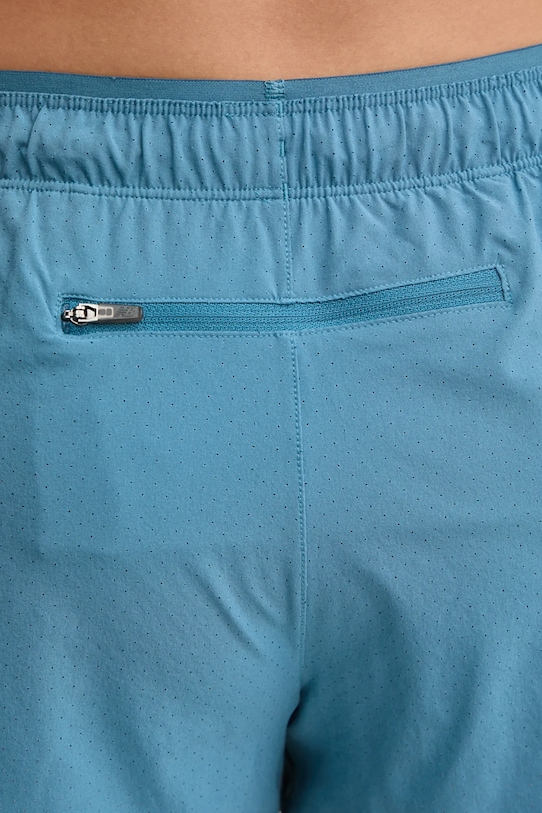 Bežecké šortky New Balance tyrkysová WS41286TEI