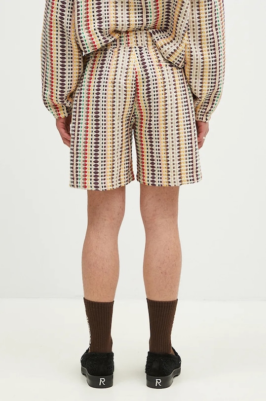 Одежда Хлопковые шорты PLEASURES Stitch Shorts P24F053 бежевый