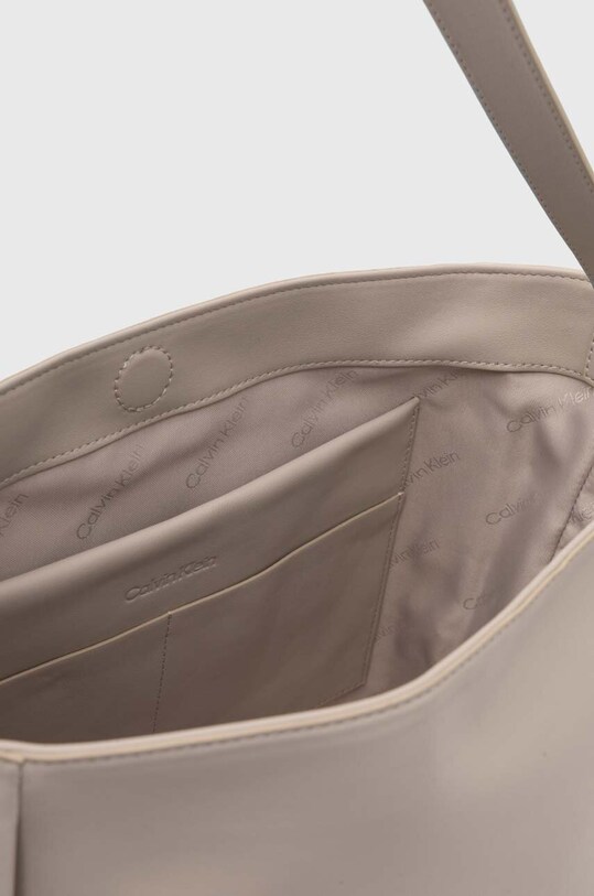 Kabelka Calvin Klein K60K612129 béžová