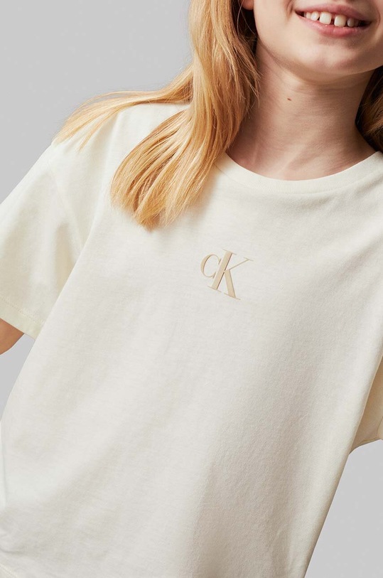 Dětské bavlněné tričko Calvin Klein Jeans IG0IG02136.9BYH.116 béžová