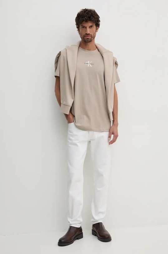 Bavlněné tričko Calvin Klein Jeans J30J325649 béžová SS25