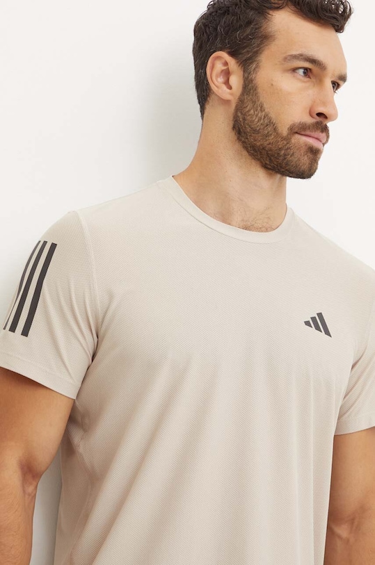 Běžecké tričko adidas Performance Own The Run Base potisk béžová IV5403