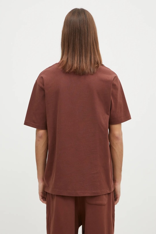 Ρούχα Βαμβακερό μπλουζάκι New Balance MT41533ROK καφέ