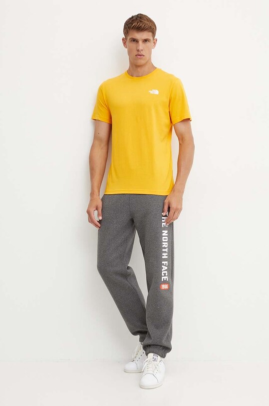 Bavlněné tričko The North Face S/S Redbox Tee NF0A87NPZU31 žlutá AW24
