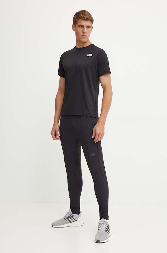 Αθλητικό μπλουζάκι The North Face 24/7 NF0A894BJK31 μαύρο AW24