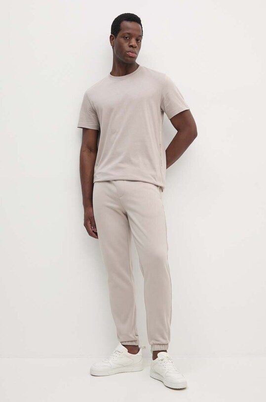 Бавовняна футболка Calvin Klein Jeans J30J326159 бежевий NC24