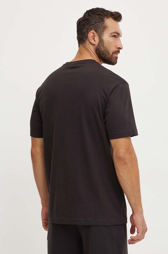 Одяг Бавовняна футболка Puma PUMA X CARROTS Graphic Tee 627443 чорний