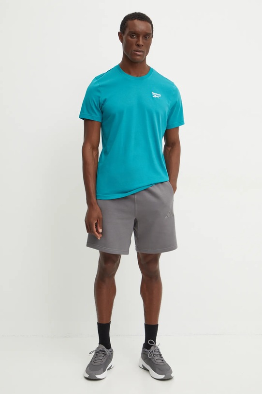 Бавовняна футболка Reebok 100206016 бірюзовий AW24