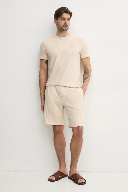 Хлопковая футболка Tommy Hilfiger UM0UM03362 бежевый SS25