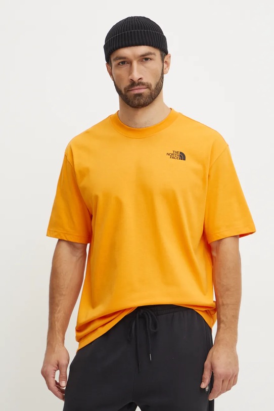 Bavlněné tričko The North Face TNF x Yinka Ilori NF0A89C91IW1 oranžová