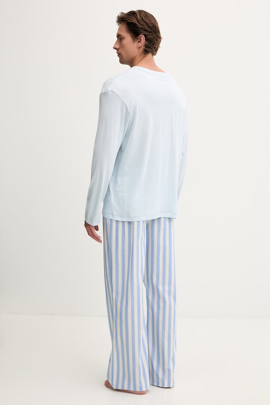 Tommy Hilfiger dvoudílné pyžamo pánské bavlněné UM0UM03663 modrá SS26
