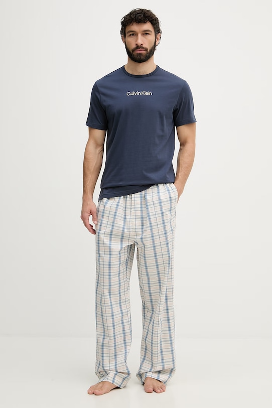 Calvin Klein Underwear pyžamové nohavice pánske bavlnené LV00NM2830 béžová SS26