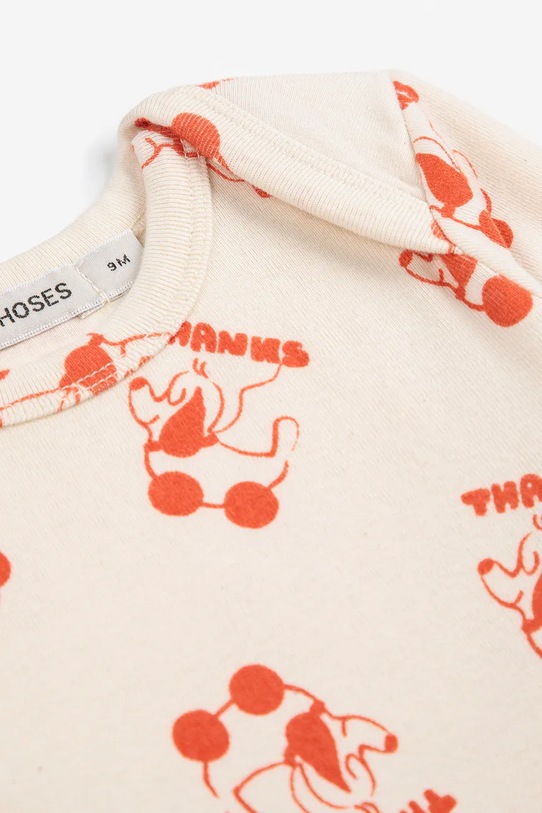 Bobo Choses pajacyk niemowlęcy Rolling Dog beżowy 225FB009