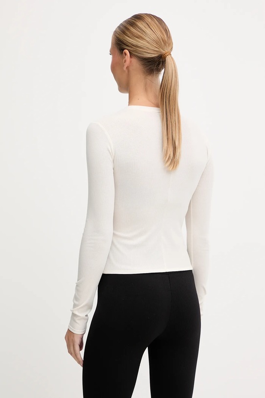 Odzież New Balance longsleeve treningowy WT53133PEF beżowy