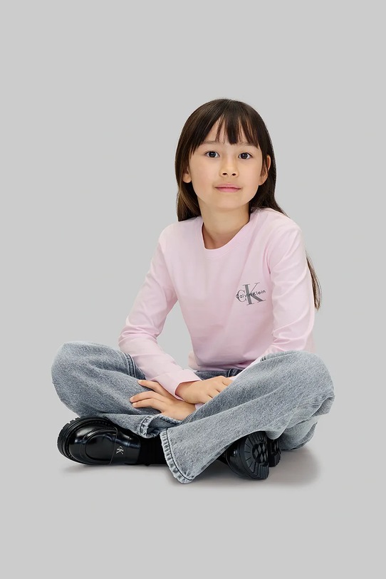 Дитячий бавовняний лонгслів Calvin Klein Jeans IU0IU00717.128.170.9BYA рожевий