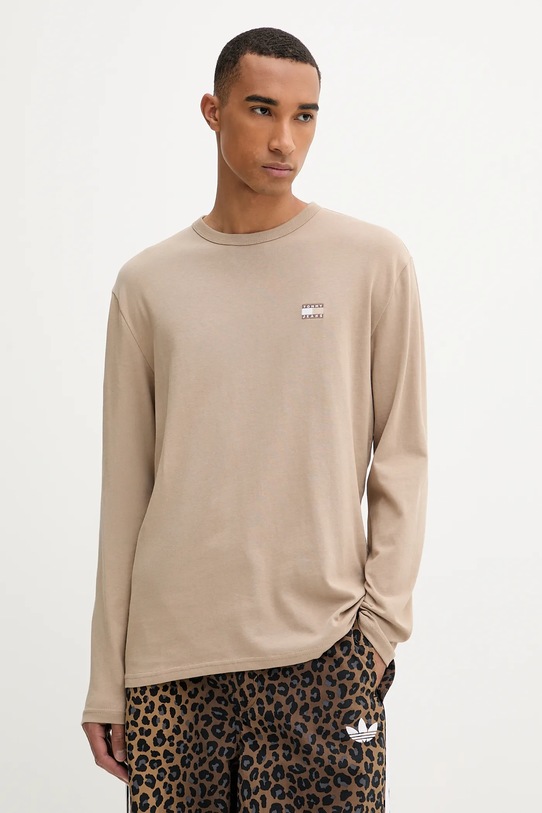 Bavlněné tričko s dlouhým rukávem Tommy Jeans kulatý hnědá DM0DM21974