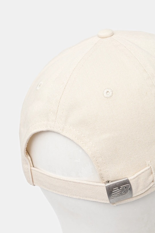 Doplňky Bavlněná baseballová čepice New Balance LAH53000PEF béžová