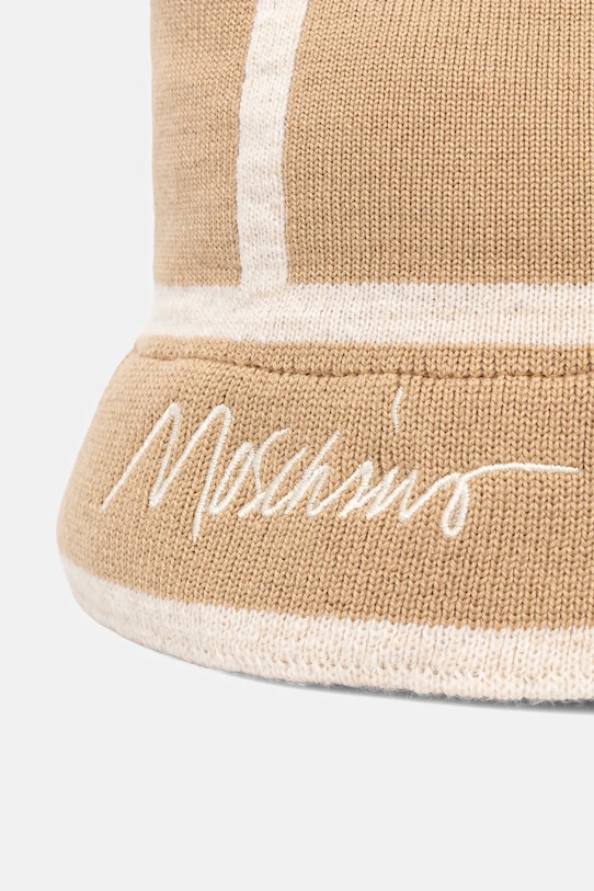 Dodatki Klobuk z volno Moschino M3353.65460 bež