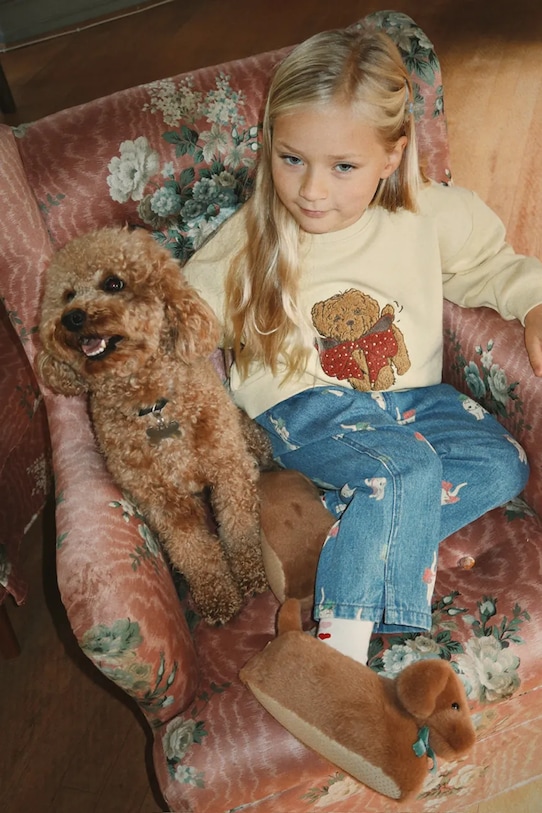 Konges Sløjd kapcie dziecięce SAUSAGE DOG FOOTIES KS105189.9BYA