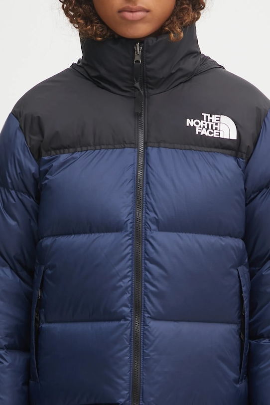 The North Face pehelydzseki 1996 Retro Nuptse NF0A3XEOGOB1 sötétkék