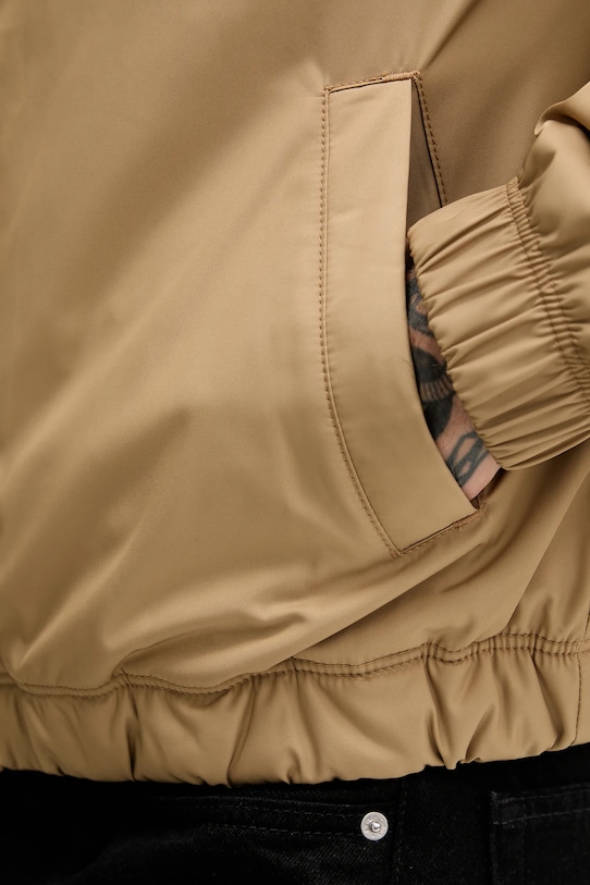 Bunda Tommy Jeans DM0DM21936 hnedá