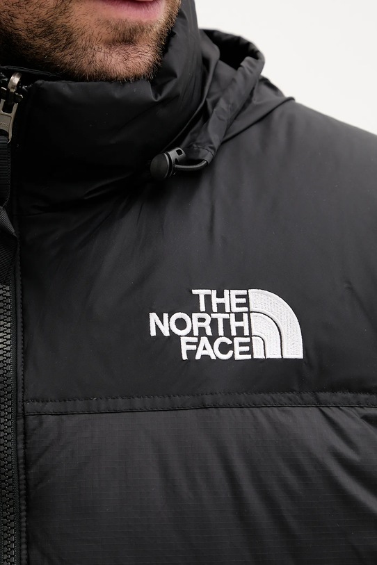 Αμάνικο από πούπουλα The North Face 1996 Retro Nuptse NF0A3JQQGOF1