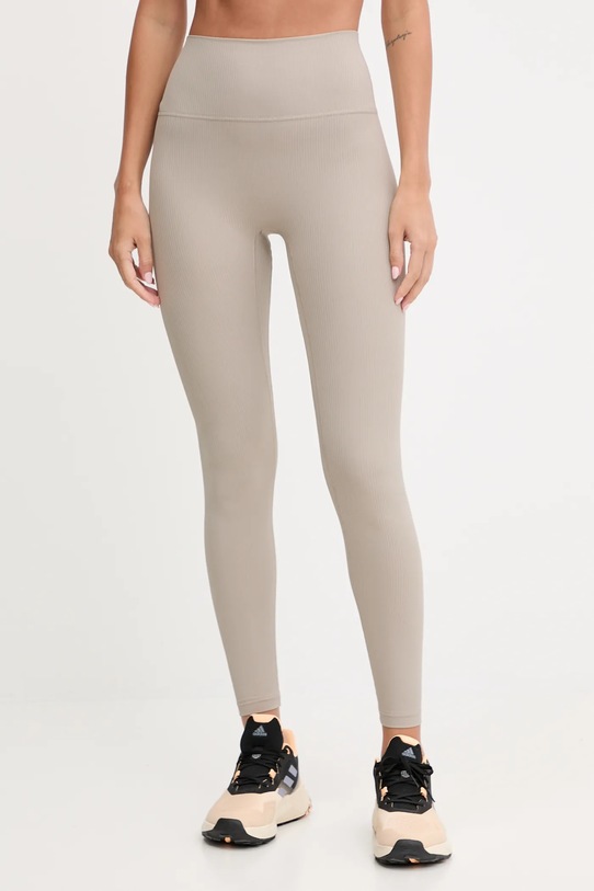 New Balance legginsy treningowe z elastanem beżowy WP53152ADS