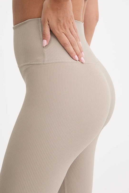 New Balance legginsy treningowe beżowy WP53152ADS