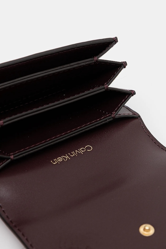 Аксесуари Гаманець Calvin Klein LV04F1083G фіолетовий
