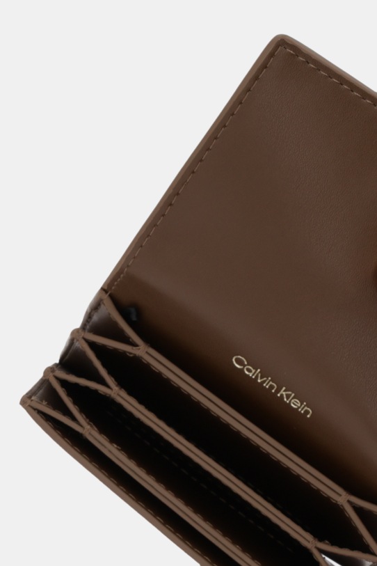 Akcesoria Calvin Klein portfel LV04F1083G beżowy