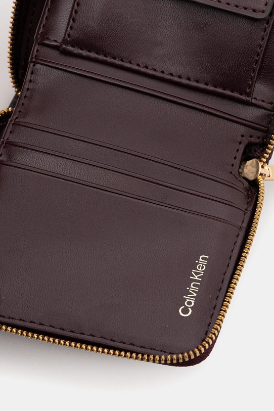 Akcesoria Calvin Klein portfel LV04F1089G fioletowy