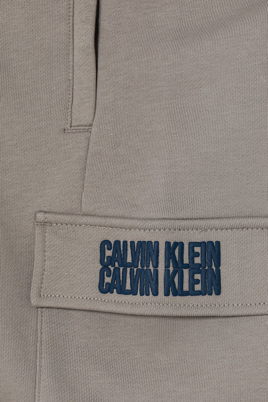 CHLAPEC Dětské bavlněné tepláky Calvin Klein Jeans TERRY IB0IB02522.9BYA šedá