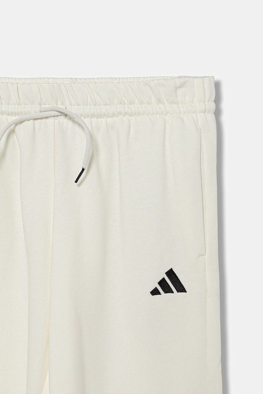 Chłopiec adidas spodnie dresowe dziecięce KC1178 beżowy