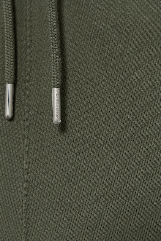 Chłopiec Calvin Klein Jeans spodnie dresowe bawełniane dziecięce IB0IB02199.9BYA zielony