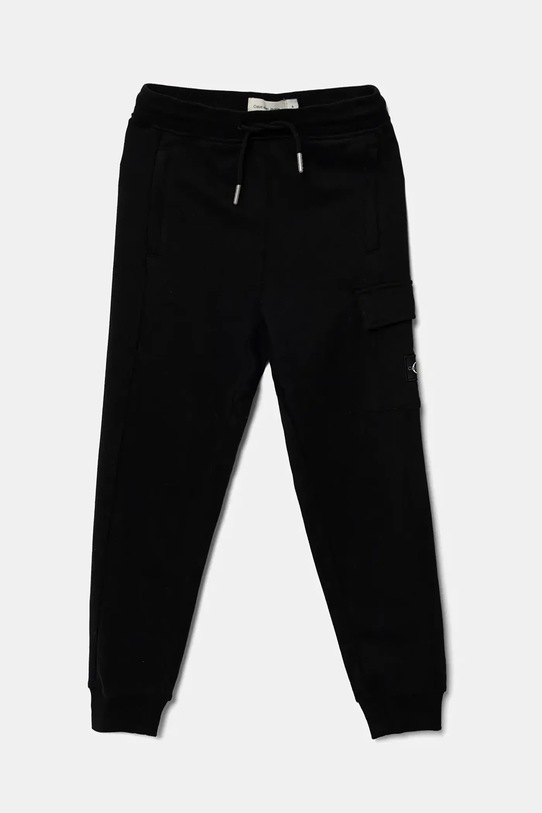 Dětské bavlněné tepláky Calvin Klein Jeans pletenina černá IB0IB02199.9BYA