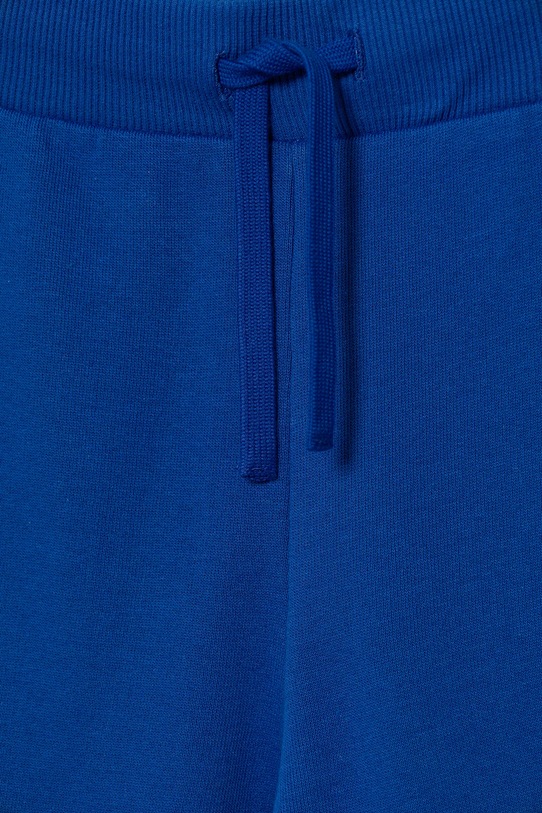 Chłopiec United Colors of Benetton spodnie dresowe bawełniane dziecięce 3J68CF01P.G.Reprop.9BYA niebieski