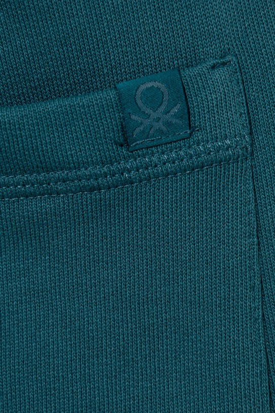 Chłopiec United Colors of Benetton spodnie dresowe bawełniane dziecięce 3J68CF01P.G.Season.9BYA turkusowy
