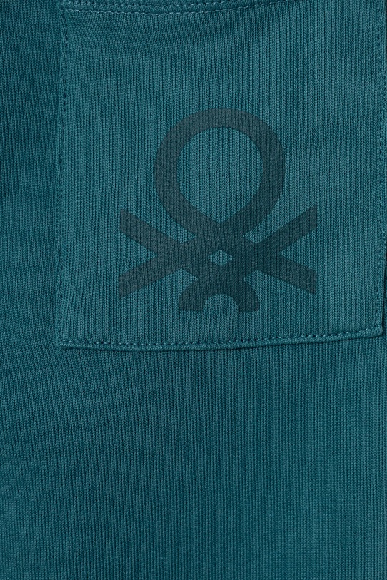 Chłopiec United Colors of Benetton spodnie dresowe bawełniane dziecięce 3J68CF058.G.Season.9BYA turkusowy